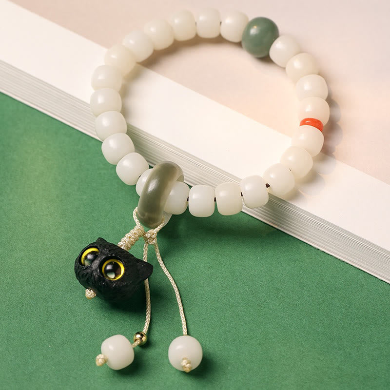 Buddha Stones Semi di Bodhi naturali Legno nero africano Bellissimo ciondolo a forma di gatto Braccialetto di pace e armonia - image 2