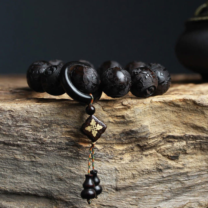 Braccialetto di equilibrio con zucca inciso con carattere cinese Yin Yang in legno di ebano Buddha Stones