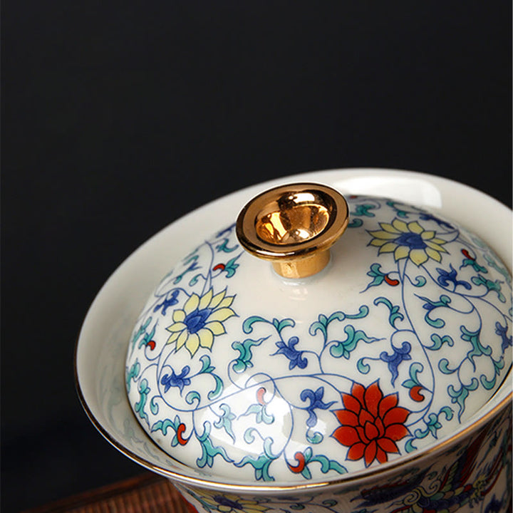 Buddha Stones Retro Prugna Fiore Pino Bambù Fenice Kirin Ceramica Gaiwan Sancai Tazza da tè Kung Fu Tazza da tè e piattino con coperchio