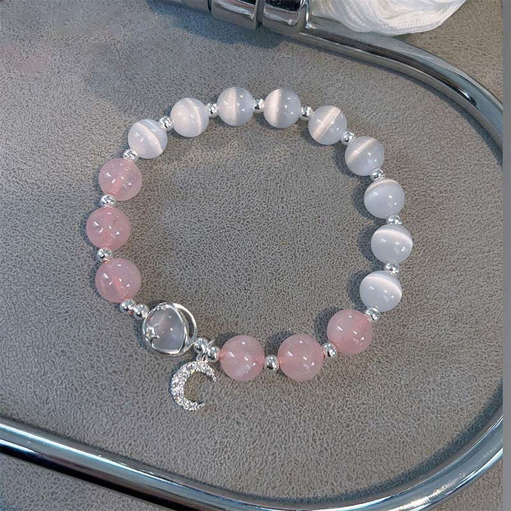 Braccialetto con ciondolo a forma di luna e cristallo rosa occhio di gatto naturale Buddha Stones