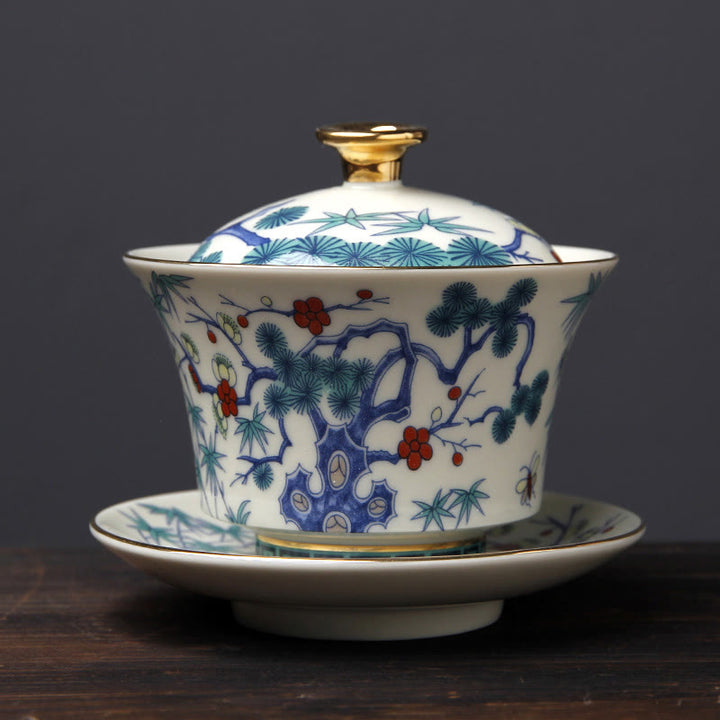 Buddha Stones Retro Prugna Fiore Pino Bambù Fenice Kirin Ceramica Gaiwan Sancai Tazza da tè Kung Fu Tazza da tè e piattino con coperchio