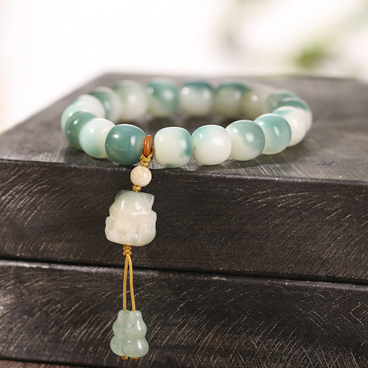 Bracciale della pace Buddha Stones, semi di Bodhi sfumati, volpe a nove code, zampa di gatto, artiglio di pigna - image 5