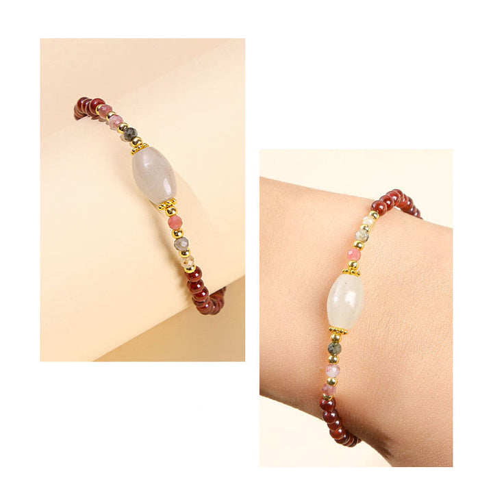 Bracciale Buddha Stones con perline di giada, tormalina e granato