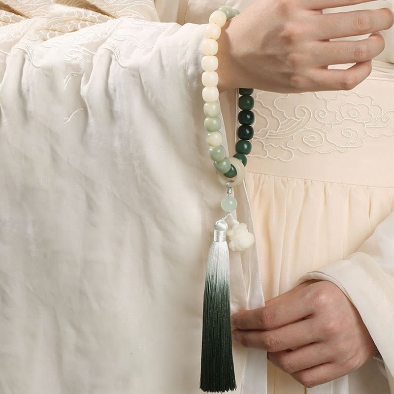 Buddha Stones Naturale Gradiente Bodhi Seed Fortuna Sacchetto di Denaro Loto Saggezza Nappa Polso Mala