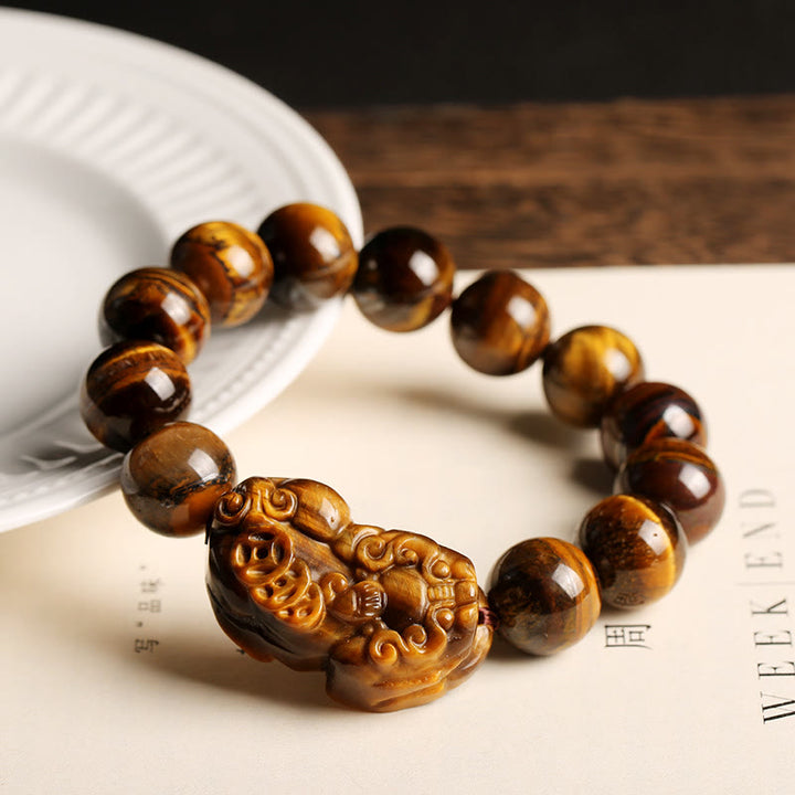 Braccialetto della ricchezza con occhio di tigre naturale Buddha Stones