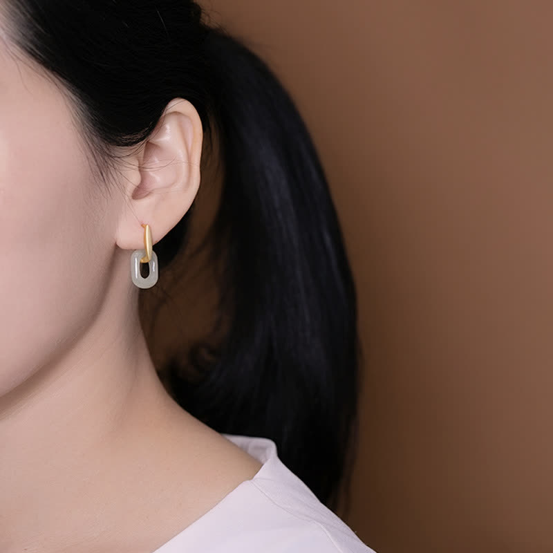 Orecchini Buddha Stones in argento sterling 925 con giada bianca rotonda e benedizione della felicità