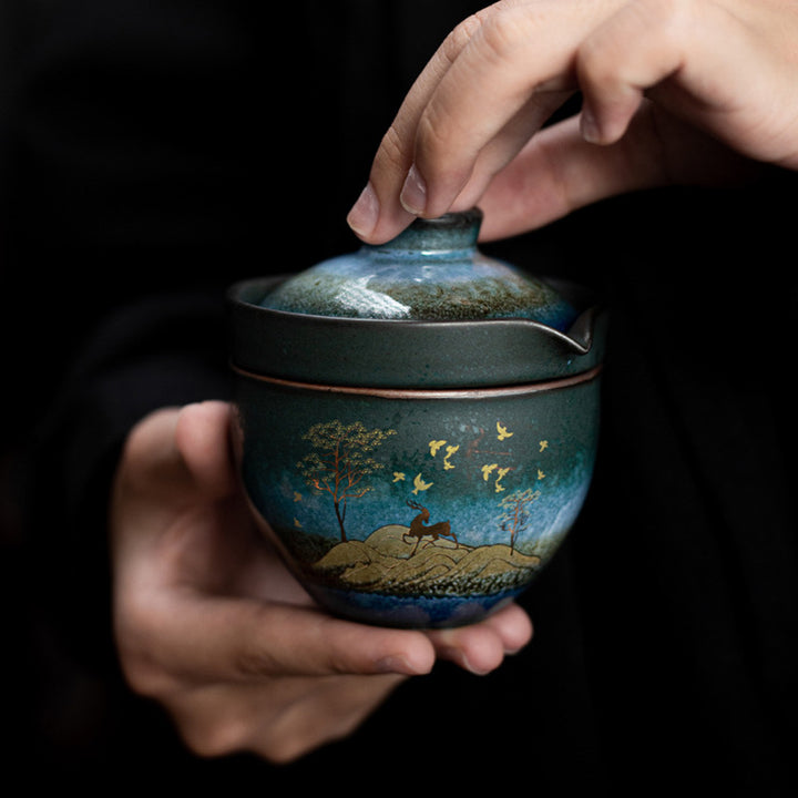 Tazza da tè in ceramica Buddha Stones Deer Mountain Trees Lovely Cat Tazza da tè nera con coperchio e borsa