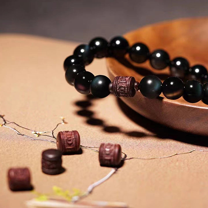 Buddha Stones Oro Naturale Ossidiana Lucente Arcobaleno Ossidiana Om Mani Padme Hum Fu Carattere Braccialetto di Guarigione