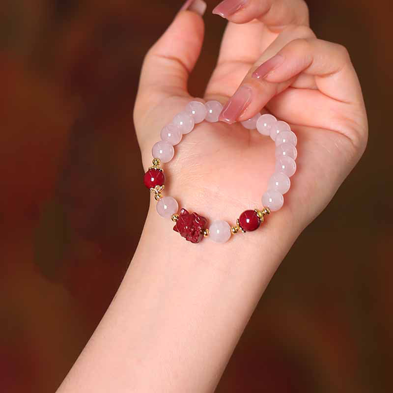 Braccialetto dell'amore con volpe a nove code in cristallo rosa naturale Buddha Stones Cinnabar