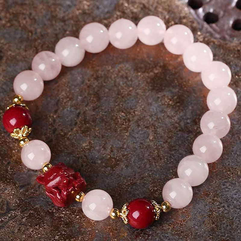 Braccialetto dell'amore con volpe a nove code in cristallo rosa naturale Buddha Stones Cinnabar