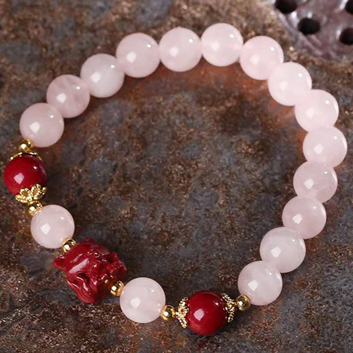 Braccialetto dell'amore con volpe a nove code in cristallo rosa naturale Buddha Stones Cinnabar