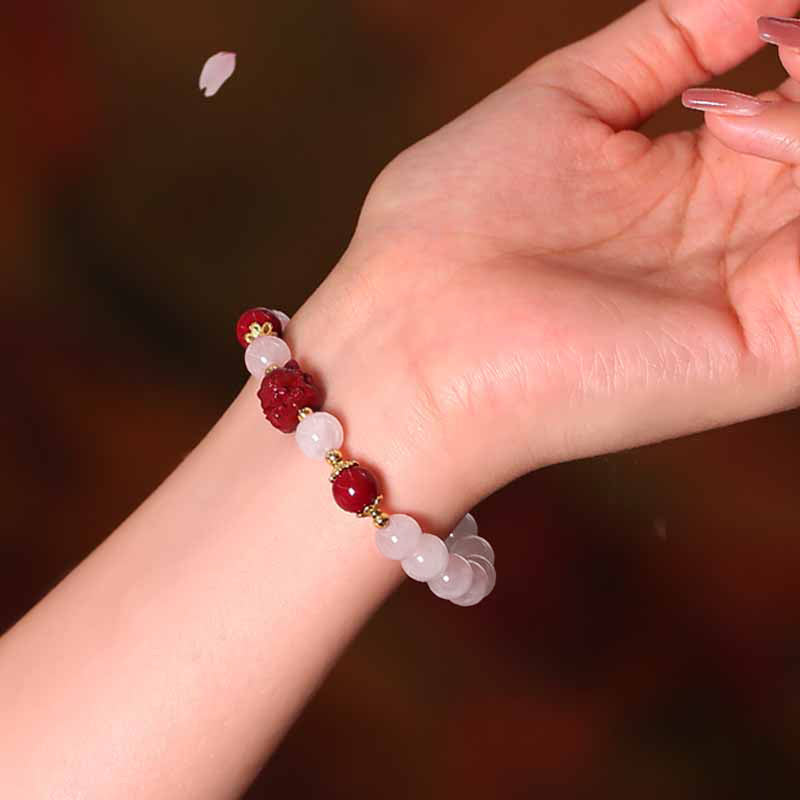 Braccialetto dell'amore con volpe a nove code in cristallo rosa naturale Buddha Stones Cinnabar