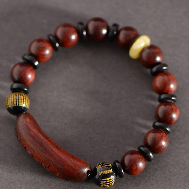 Braccialetto di protezione inciso con piccole foglie di sandalo rosso Om Mani Padme Hum Buddha Stones