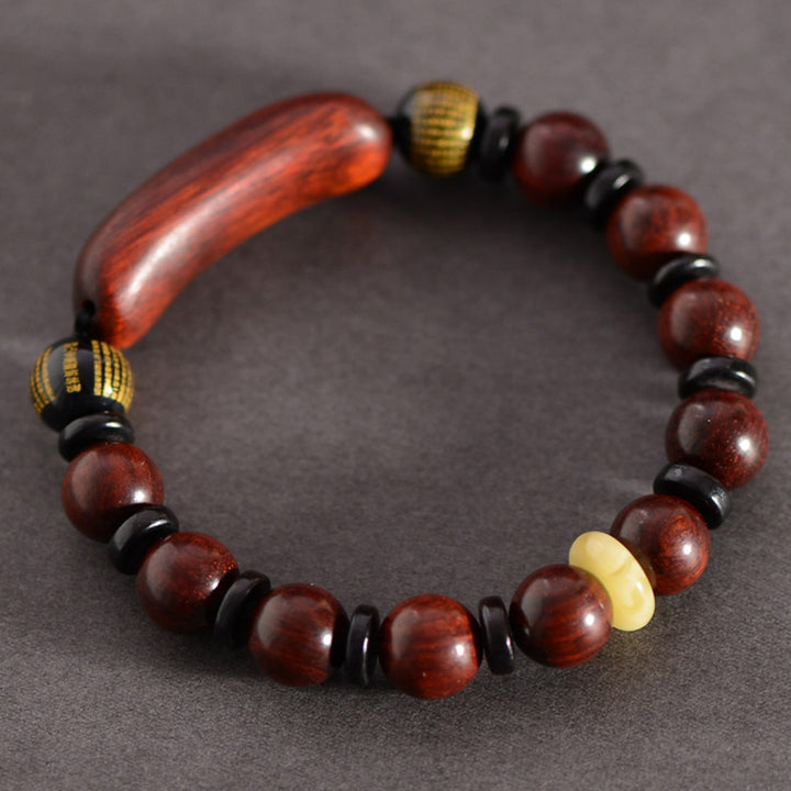 Braccialetto di protezione inciso con piccole foglie di sandalo rosso Om Mani Padme Hum Buddha Stones
