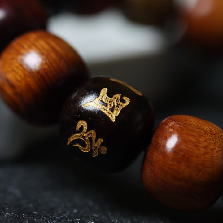 Buddha Stones Tibet Vari Legni Om Mani Padme Hum Braccialetto della Purezza