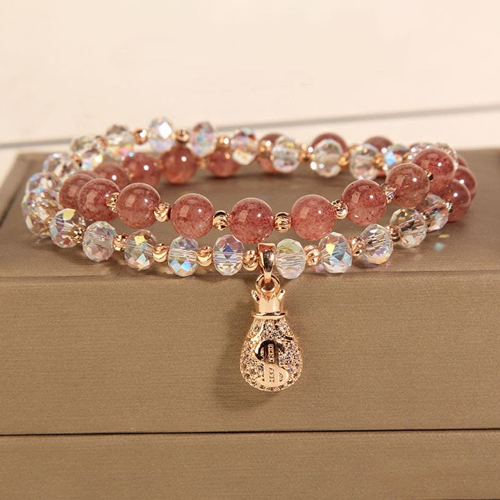Braccialetto positivo con ciondolo a forma di borsa per soldi in cristallo bianco e quarzo fragola Buddha Stones