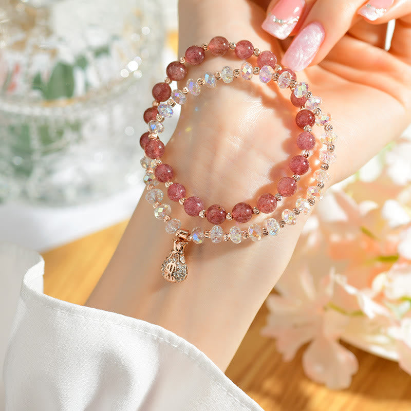 Braccialetto positivo con ciondolo a forma di borsa per soldi in cristallo bianco e quarzo fragola Buddha Stones
