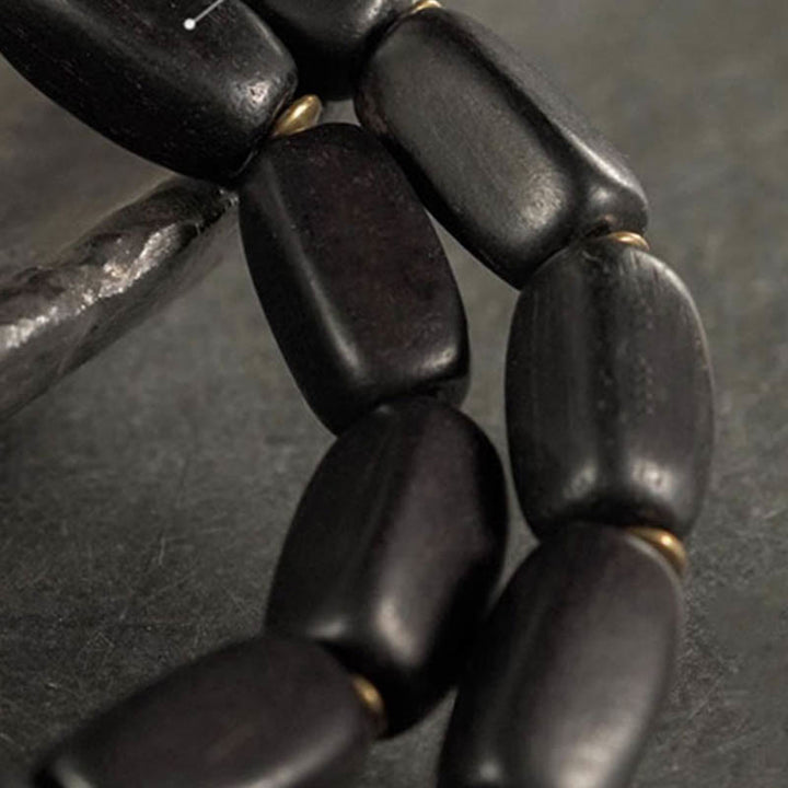 Braccialetto doppio giro in rame con perline di legno di Buddha Stones del Tibet Dzi