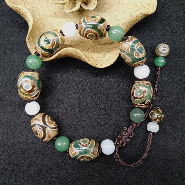 Braccialetto intrecciato con Buddha Stones Dzi tibetane a tre occhi e protezione dalla fortuna