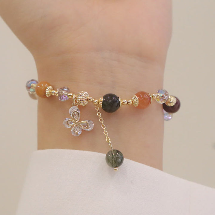 Braccialetto con ciondolo a farfalla con cristallo arcobaleno naturale Fu Lu Shou Buddha Stones Rutilato