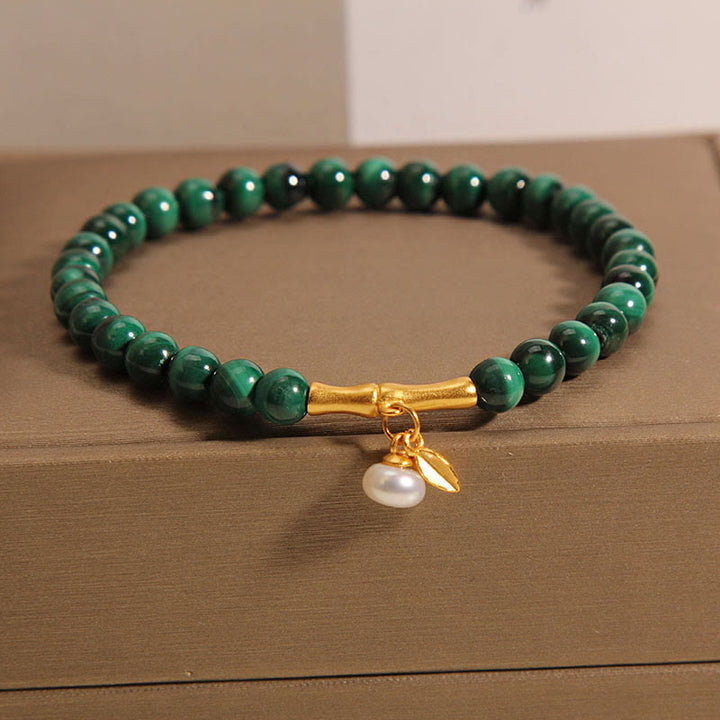 Bracciale anti-ansia in bambù portafortuna con perle di malachite naturale Buddha Stones