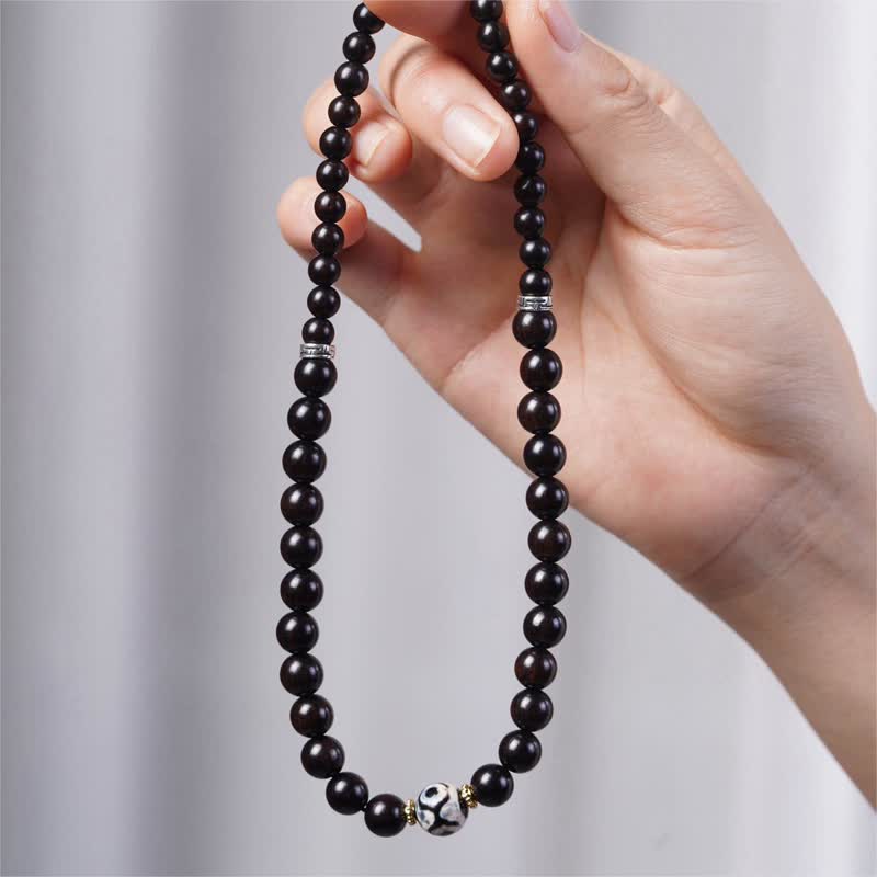 Braccialetto doppio giro in perline di legno di ebano del Tibet Dzi Buddha Stones