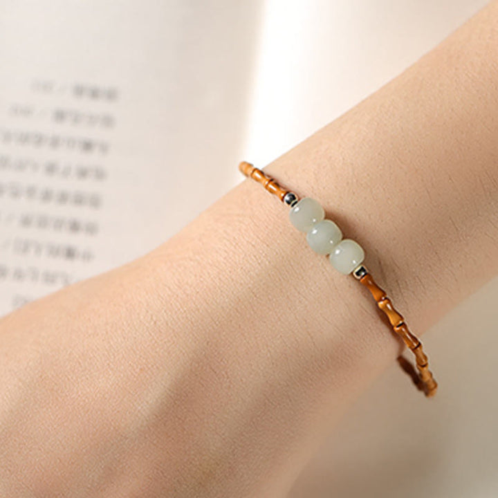 Buddha Stones Braccialetto portafortuna con perline di giada Hetian con motivo in bambù e noccioli di oliva naturali