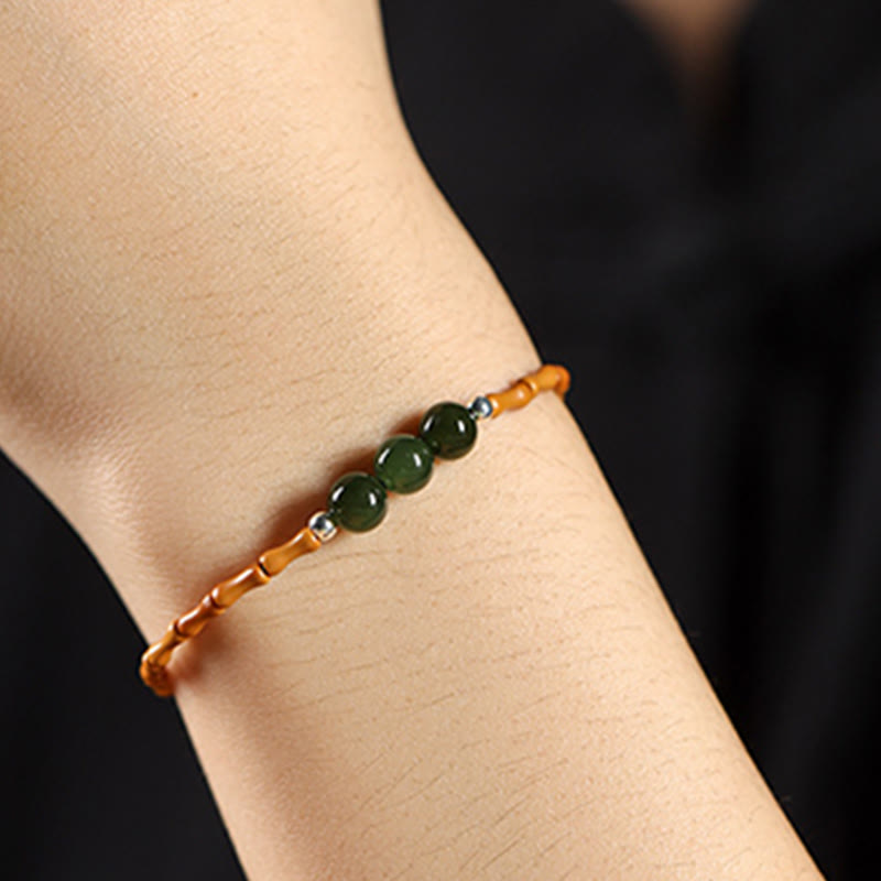 Buddha Stones Braccialetto portafortuna con perline di giada Hetian con motivo in bambù e noccioli di oliva naturali