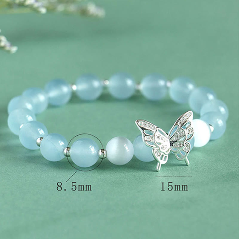 Braccialetto energetico a farfalla in calcedonio blu, cristallo rosa e calcedonio viola Buddha Stones