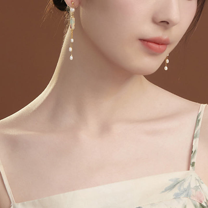 Orecchini pendenti con perle curative in argento sterling 925 Buddha Stones e perle di Shoushan