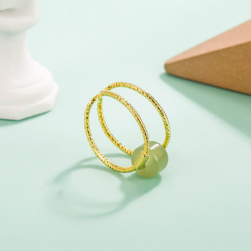 Anello regolabile con perle di giada rotonde in Buddha Stones e doppio strato di rame