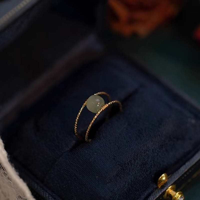 Anello regolabile con perle di giada rotonde in Buddha Stones e doppio strato di rame