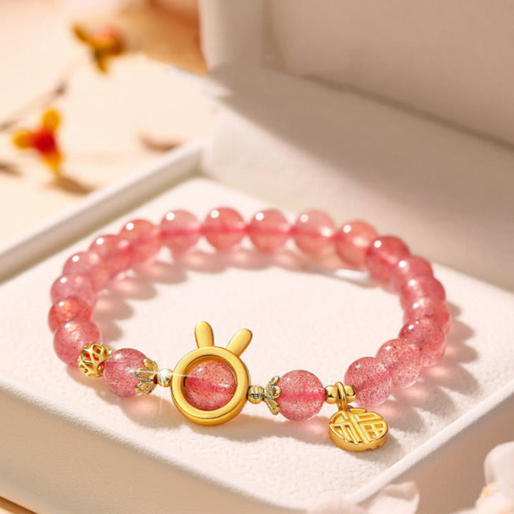 Braccialetto di guarigione in cristallo rosa con carattere Fu in quarzo fragola Buddha Stones
