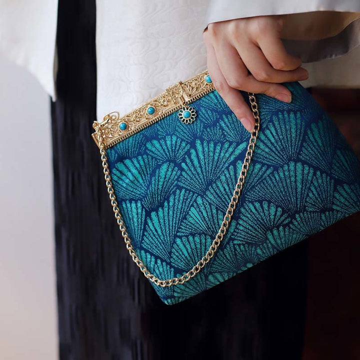 Borsa a tracolla con catena in metallo e linee blu Buddha Stones