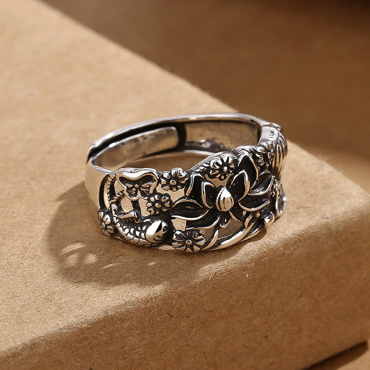 Anello dell'illuminazione con simbolo di loto e pesce koi Buddha Stones