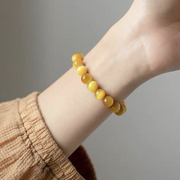 Braccialetto di protezione della fortuna con perline di occhio di tigre e Buddha Stones