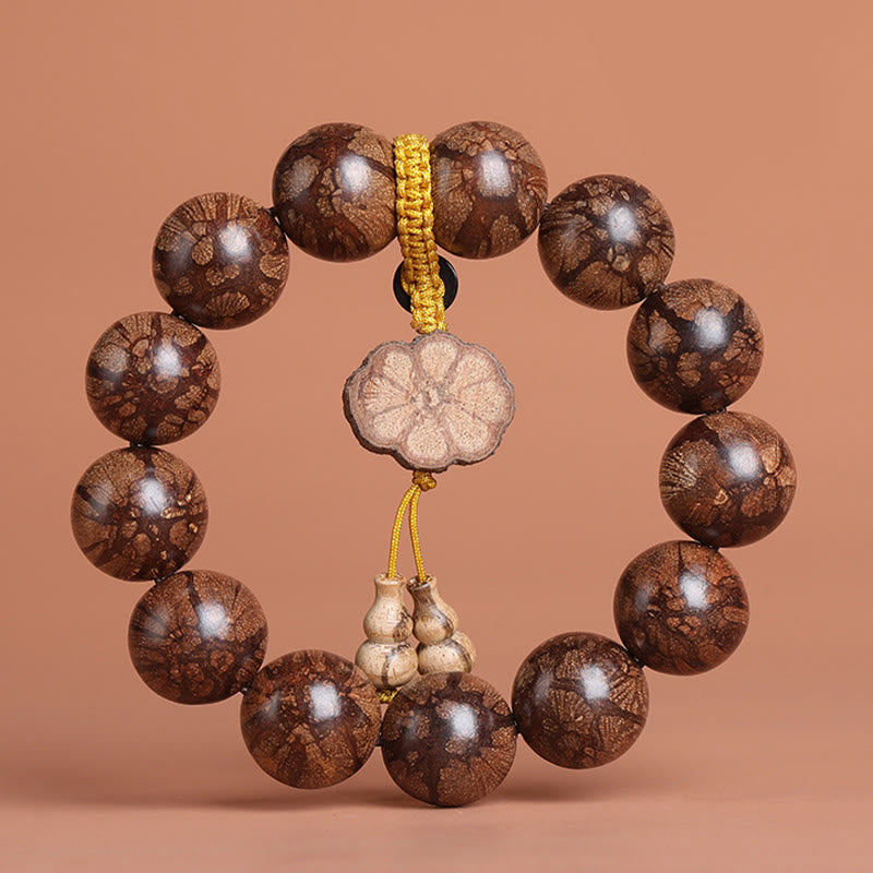 Bracciale Buddha Stones Plum Blossom Wood per la pace interiore