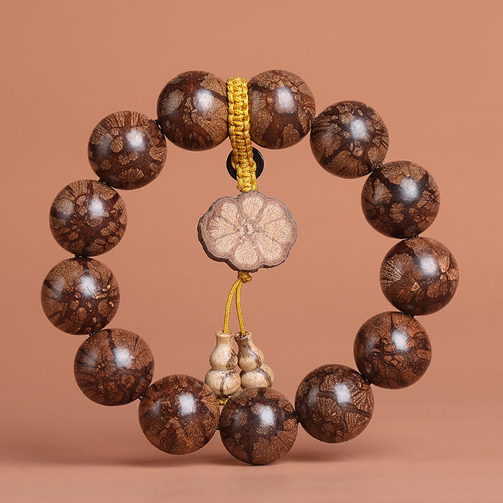 Bracciale Buddha Stones Plum Blossom Wood per la pace interiore