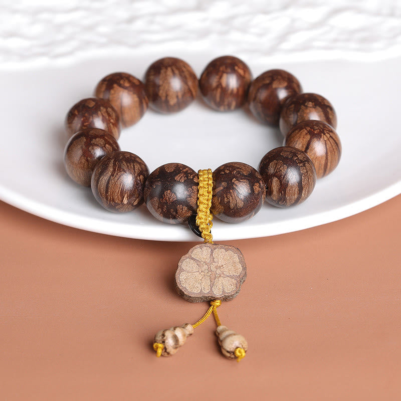 Bracciale Buddha Stones Plum Blossom Wood per la pace interiore