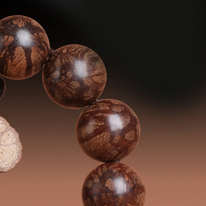 Bracciale Buddha Stones Plum Blossom Wood per la pace interiore