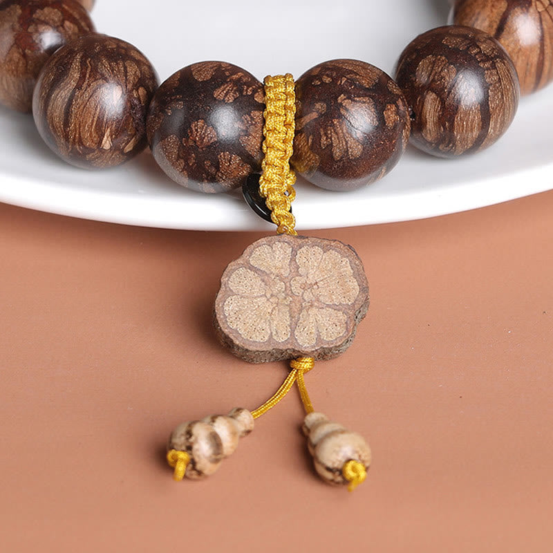 Bracciale Buddha Stones Plum Blossom Wood per la pace interiore