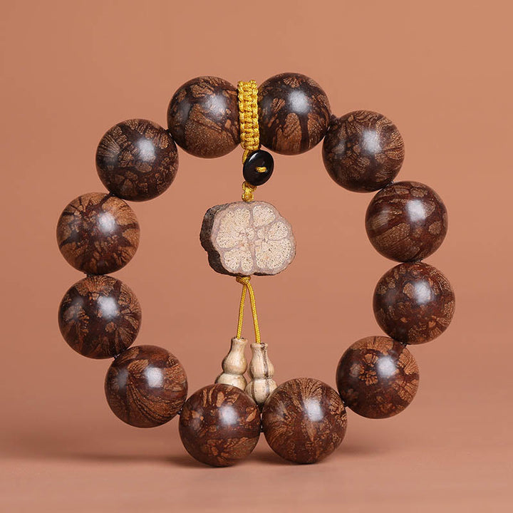 Bracciale Buddha Stones Plum Blossom Wood per la pace interiore