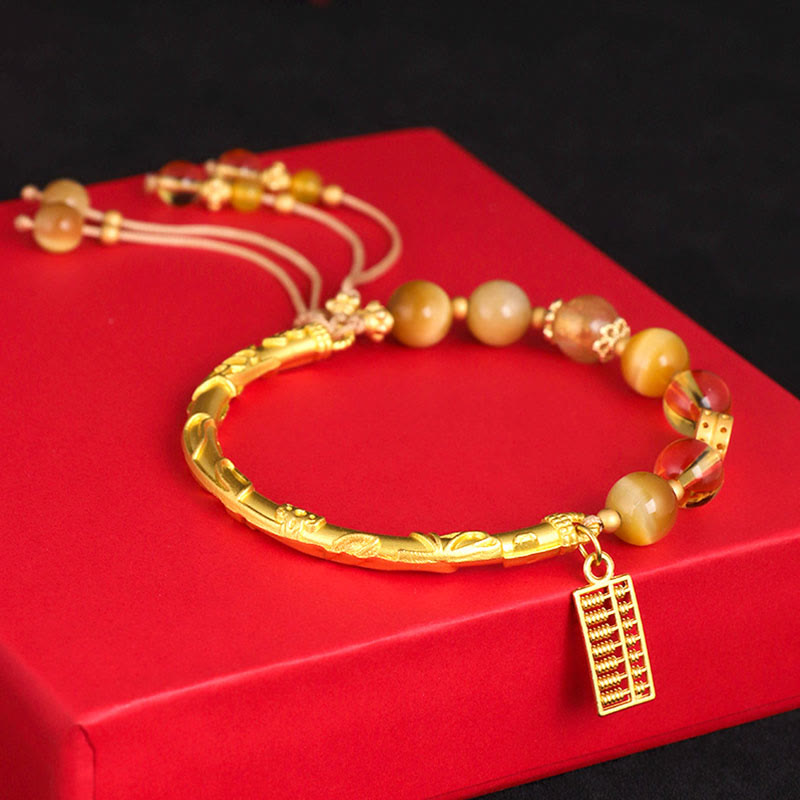 Braccialetto di protezione con ciondolo abaco in occhio di tigre naturale e citrino Buddha Stones