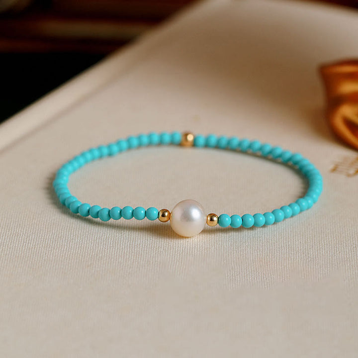 Braccialetto di protezione con piccole perle di agata rossa e turchese Buddha Stones