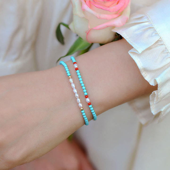 Braccialetto di protezione con piccole perle di agata rossa e turchese Buddha Stones