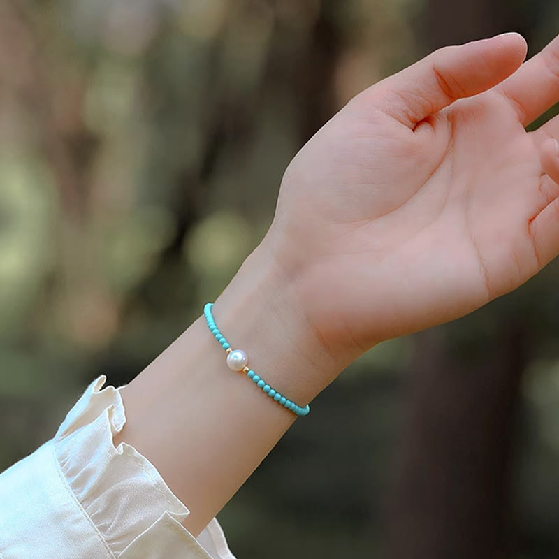 Braccialetto di protezione con piccole perle di agata rossa e turchese Buddha Stones