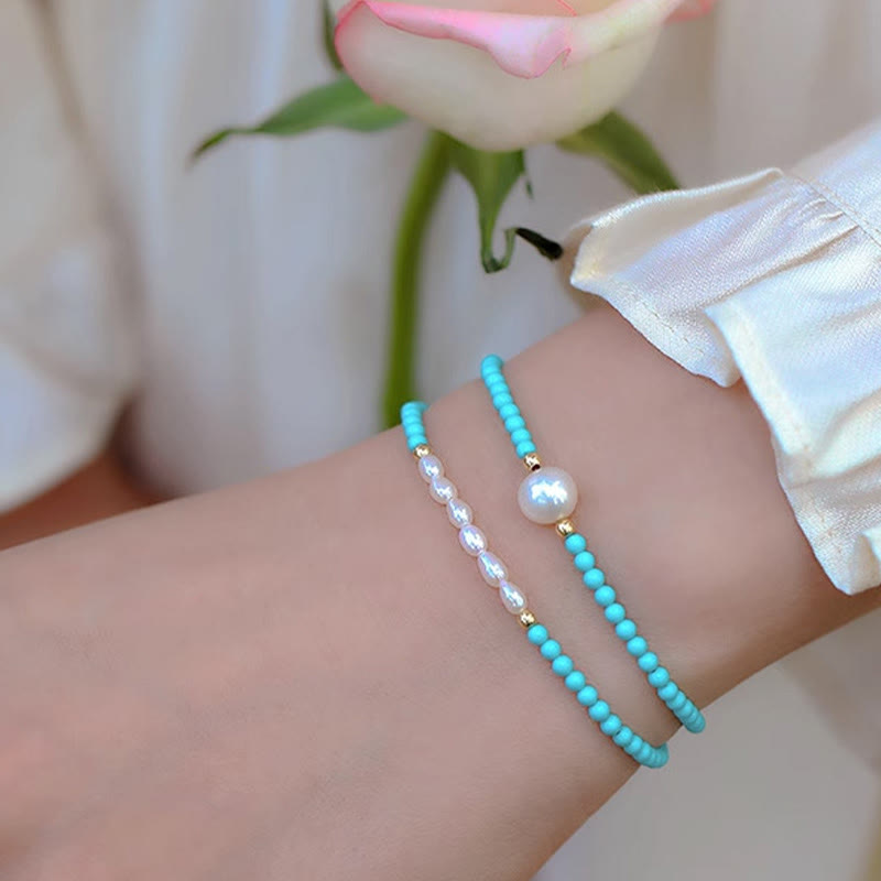 Braccialetto di protezione con piccole perle di agata rossa e turchese Buddha Stones