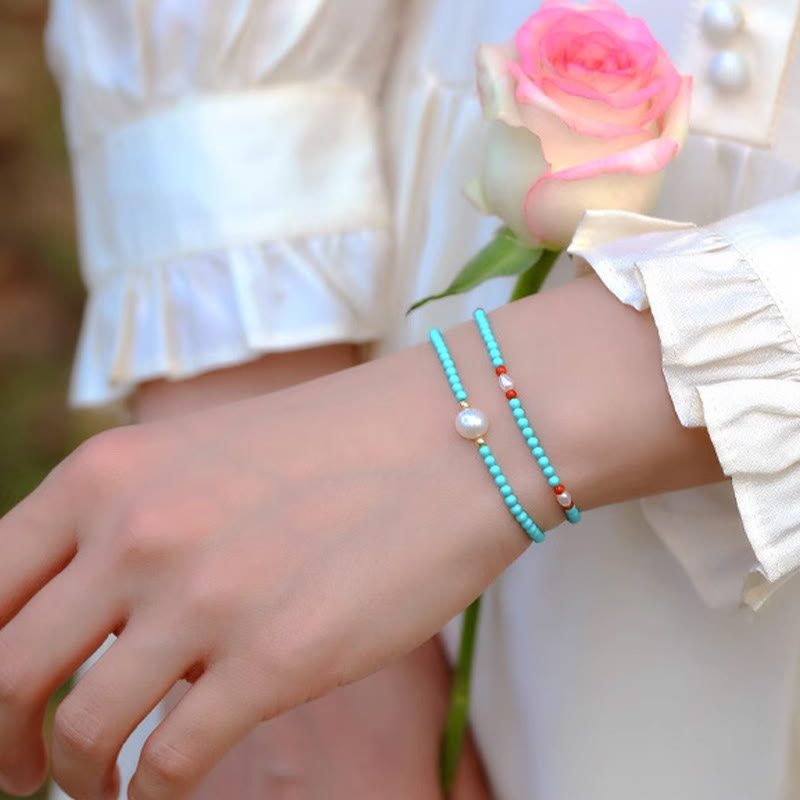 Braccialetto di protezione con piccole perle di agata rossa e turchese Buddha Stones