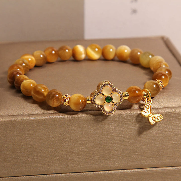 Braccialetto di protezione con farfalla a quadrifoglio e occhio di tigre Buddha Stones
