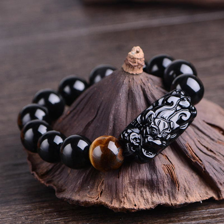 Braccialetto Buddha Stones in ossidiana nera naturale PiXiu Tiger's Eye Strength